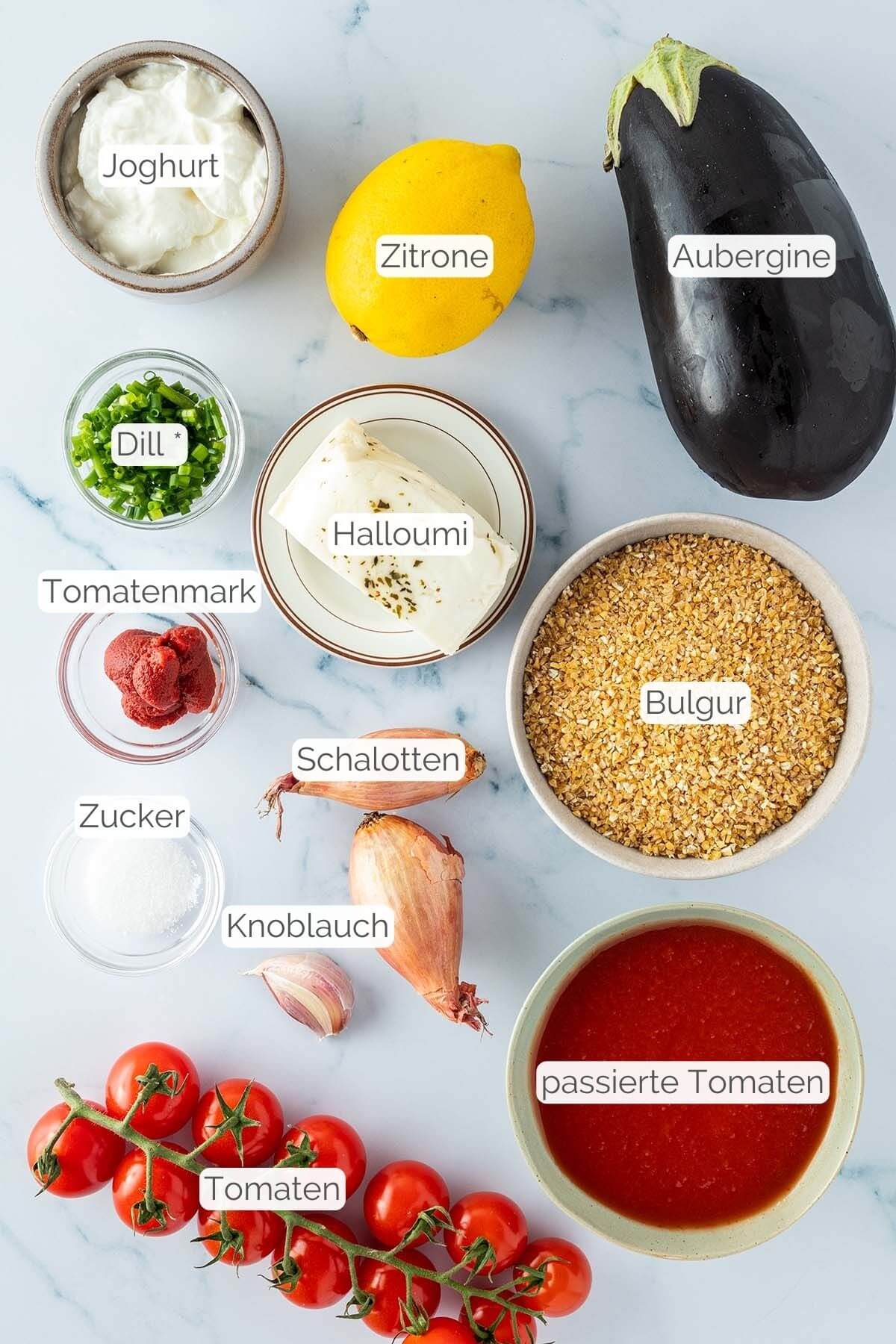 Foto aller Zutaten mit jeweiligen Textbeschriftungen, die f&uuml;r die Halloumi Bowl ben&ouml;tigt werden.