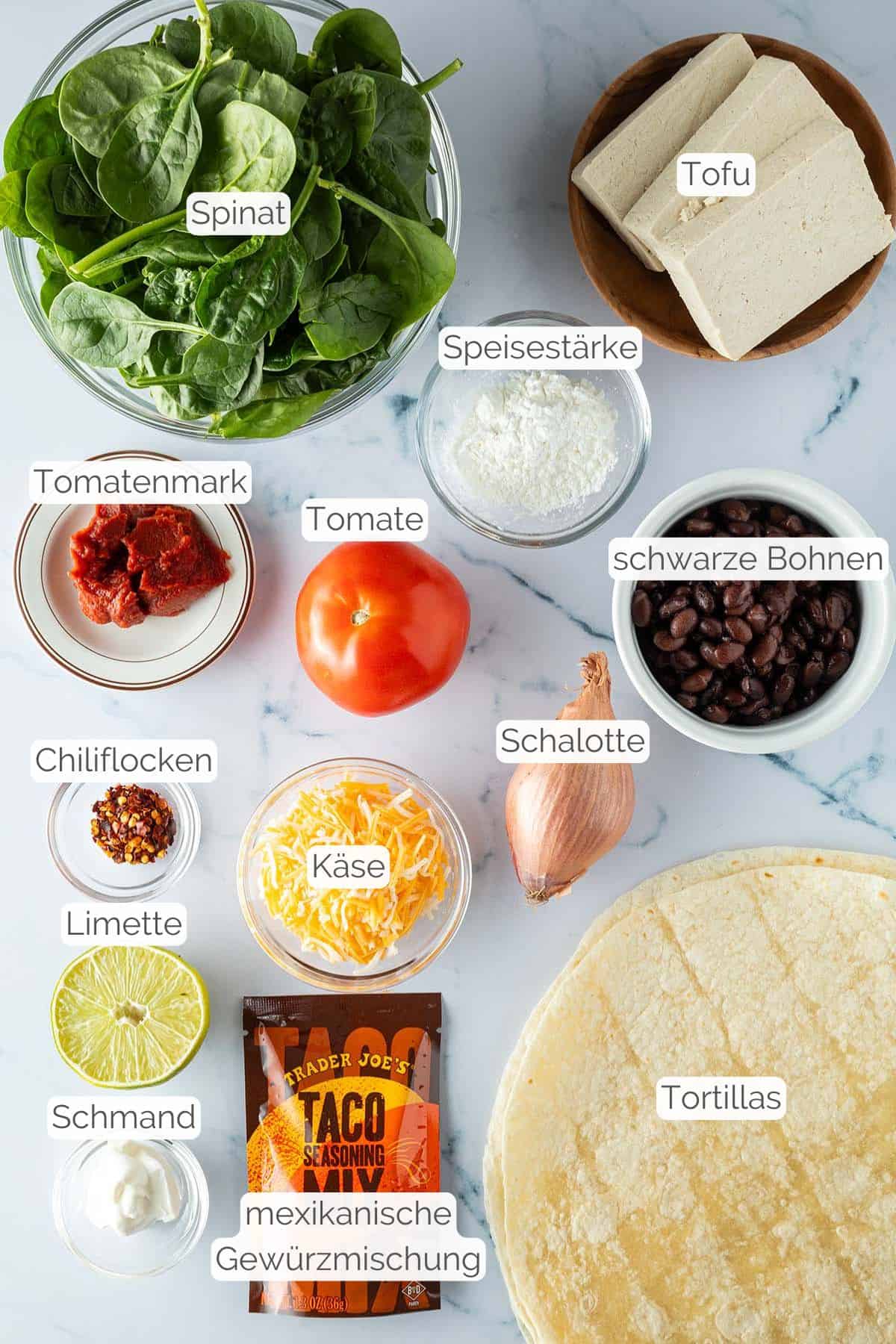 Alle Zutaten mit Textbeschriftungen, die f&uuml;r den vegetarischen Burrito ben&ouml;tigt werden.